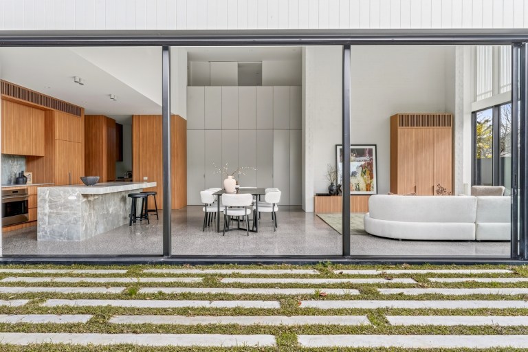 Rear view through full-height glazing into 1 Carrigal Street