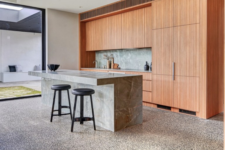 Timber kitchen with a stone island at 1 Carrigal Street